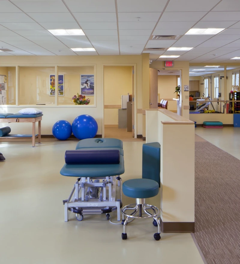 Assessment zone showing gait and posture analysis equipment.